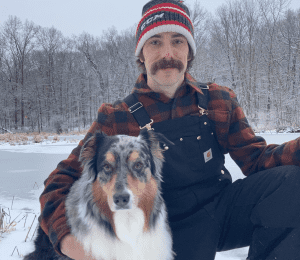 OLD TIME HAWKEY WITH HIS DOG