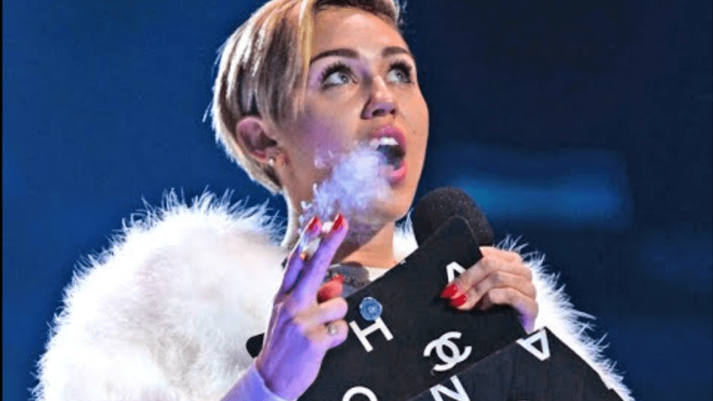 Miley Cyrus lighting marijuana on stage at the 2013 MTV EMAs